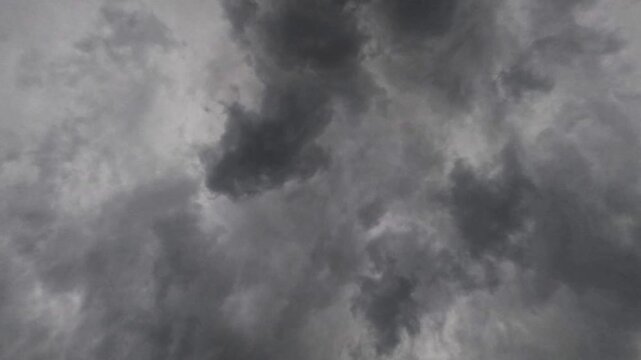 Dense dark clouds dominate the sky