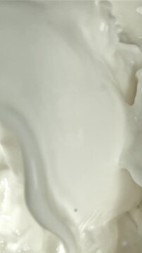 Fresh milk with splashes. Filmed on a high-speed camera at 1000 fps. High quality FullHD footage