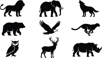 Minimalist black animal silhouettes featuring lion, elephant, wolf, bear, eagle, cheetah, owl, deer, and rhinoceros for creative design and commercial use © boishakhisarker