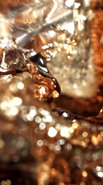 Ice cubes fall into a glass with cola. Filmed is slow motion 1000 fps. High quality FullHD footage