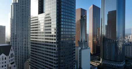 Obraz premium Los Angeles skyline urban architecture towers. Los Angeles downtown business skyline panorama. Los Angeles modern skyscrapers cityscape view. Los Angeles aerial skyline sunny California.