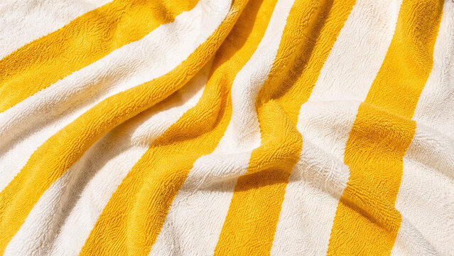Yellow and White Striped Towel Fabric Texture Close-Up