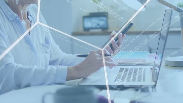 Woman toggling phone and laptop, causing glowing pentagonal overlay for business review