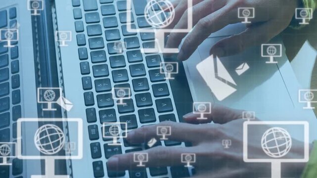 Tech user typing on laptop keyboard sending mail and growing globe and mail icons obscuring hands