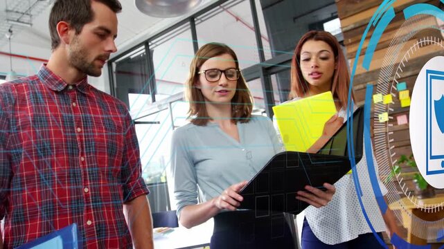 Tech team reviewing black folder and yellow binder camera panning phone shield moving aligning plan