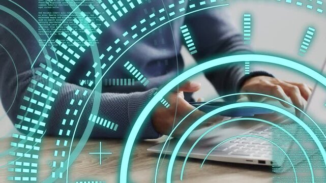 Man at desk placing blue phone near keyboard and tapping, HUD overlay syncing business data