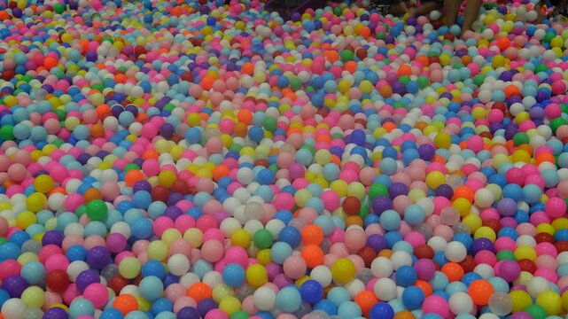 Children playing in ball pool
