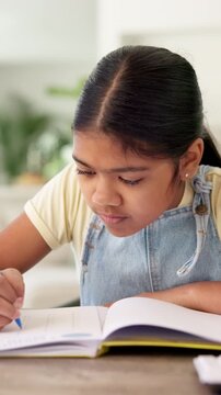 Study, thinking and child with writing homework for math assessment, equation solution or growth. Student, kid or numeracy assignment in house for problem solving, sum answer or academic development