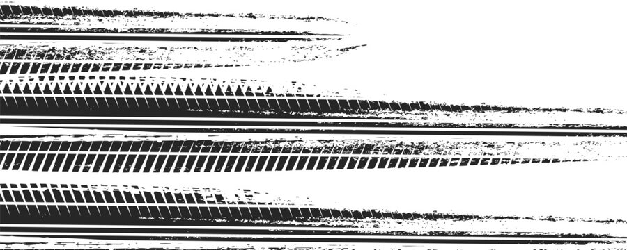 Black tire marks on road, Black rubber tire marks and tread marks, Tire trace track wheels texture and background, Auto tire tread grunge, Car wheel tyre tread track black tyre print, Top view.