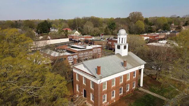 Aerial flyover view of the old courthouse and downtown Hillsborough, North Carolina, in Orange County