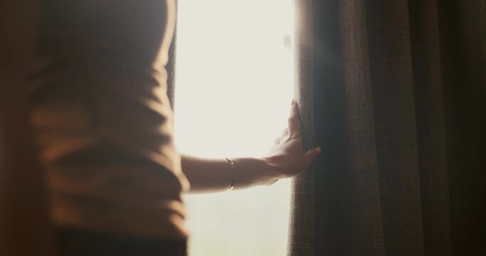 Woman, sad and hand in home with curtain, mistake or regret with reflection for decision. Person, contemplation and thinking for perspective, loss or grief with mental health in morning in house