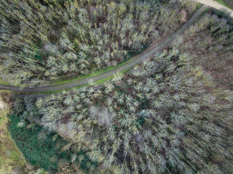 A riverloop of a muddy river on a cold autumn day,seen from above