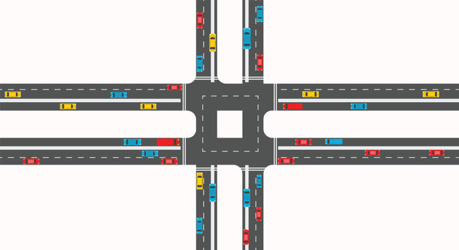 Overhead view of four-way traffic intersection with cars on roads and crosswalks