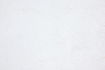 Fototapeta premium Fondo de pared de yeso blanco liso y limpio con textura de grano sutil, superficie de diseño minimalista. Fondo de textura de pared blanca para diseños gráficos, fondos de sitios web,recursos digital