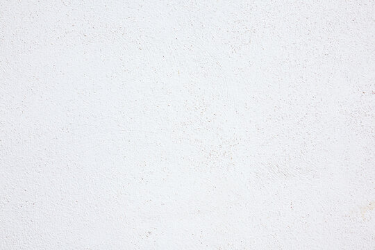 Fondo de pared de yeso blanco liso y limpio con textura de grano sutil, superficie de dise&ntilde;o minimalista. Fondo de textura de pared blanca para dise&ntilde;os gr&aacute;ficos, fondos de sitios web,recursos digital