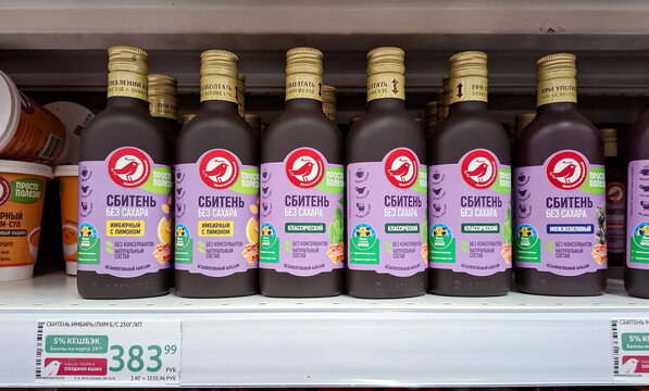 MOSCOW, Russia - March 21, 2026.Glass bottles of traditional Russian herbal drink Sbiten on grocery store shelf in city market