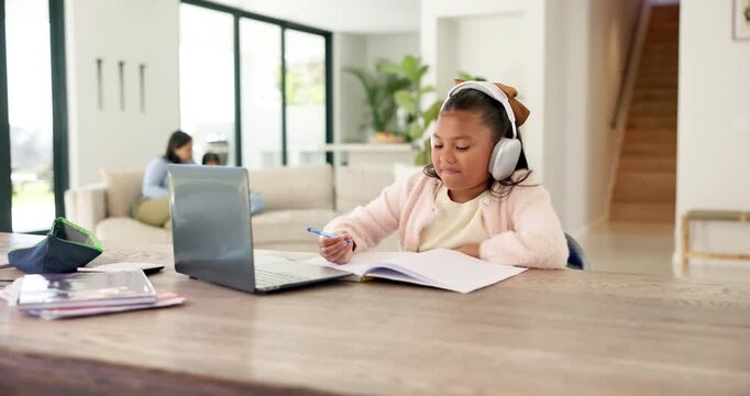 Laptop, headphones and kid with video call for elearning in house with studying for test or homework. Audio tech, wave and student with computer for virtual lesson for writing notes in online class.