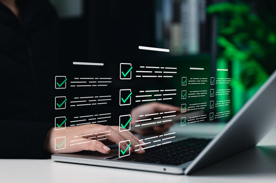 Online assessment and survey concept. Person using laptop with virtual checklist form, check mark, digital questionnaire, online test, exam, quiz, feedback response, data collection, task verification