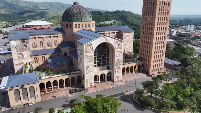 Catholic Temple In Aparecida Sao Paulo Brazil. Aerial View Of Church Building Dominating The Skyline. Business Sky Background Downtown Cityscape. Outdoor Downtown Panoramic City. Aparecida Sao Paulo.