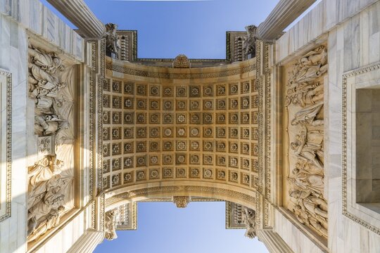 Low angle view of the Arco della Pace, Peace Arch, 1807-1838, design and construction started by Luigi Cagnola, completed by Francesco Londonio and Francesco Peverelli, classicism, Piazza Sempione, Milan, Lombardy, Italy