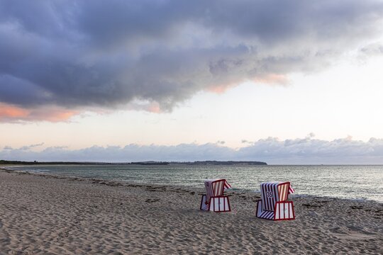 Lonely beach chairs in the morning light at the big beach of Thiessow, island R&uuml;gen, Baltic Sea, Mecklenburg-Western Pomerania, East Germany