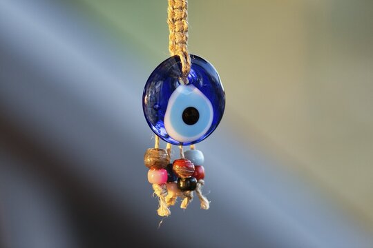 Eye of Fatima, Nazar, Boncuk, blue glass bead, amulet against the evil eye hangs on cord, decoration