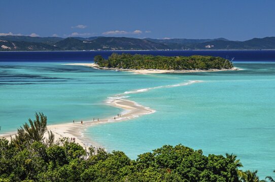 Overlook over the turquoise waters and a sand tongue on the island of Nosy Iranja near Nosy Be, Madagascar