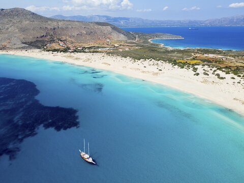 Drone shot, double bay of Simos beach, Sarakiniko beach, Elafonisos, Deer Island, Laconia, Peloponnese, Ionian Islands, Ionian Sea, Greece
