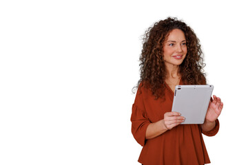 Naklejka premium Professional woman with curly hair smiling and holding a tablet, communicating with technology, transparent background
