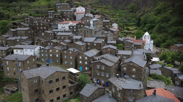 Aerial view of piodao, a historic schist village nestled in the mountains of serra do acor, portugal