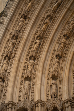 Macro view of ancient gothic 
stone carvings and statues. 
Abstract medieval architecture 
background of cathedral portal 
archivolts. High resolution 
33MP texture.
