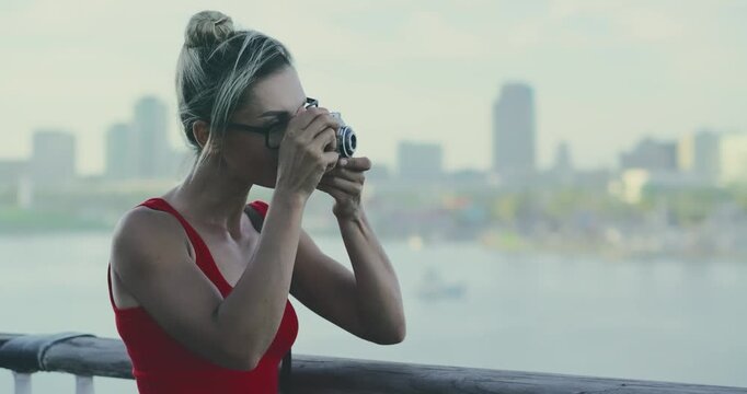 Woman Taking Photos on a Cruise Ship Deck