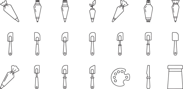 Collection of baking and decorating tools including piping bags spatulas palette and knife baking tools