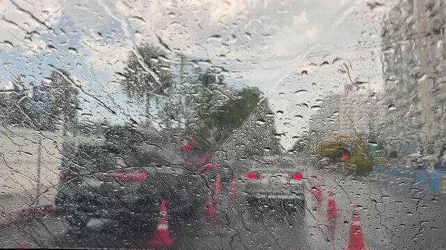 raining, droplet of water on Car mirror at Evening
