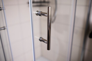 Fototapeta premium Simple Door Handle on Cheap Glass Door
