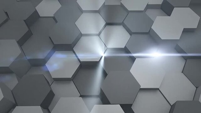 Abstract background featuring a pattern of dark and light gray hexagonal shapes