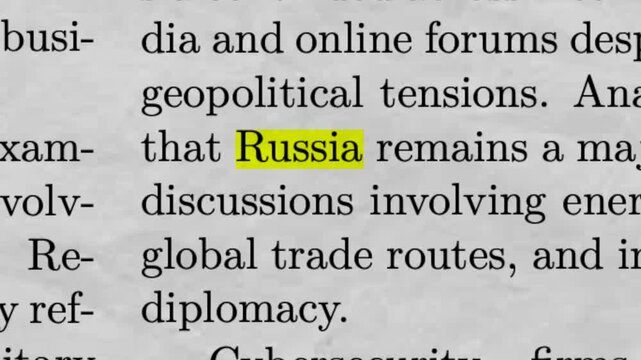 Russia Highlighted in Newspaper Article Geopolitics Conflict and Global News Concept