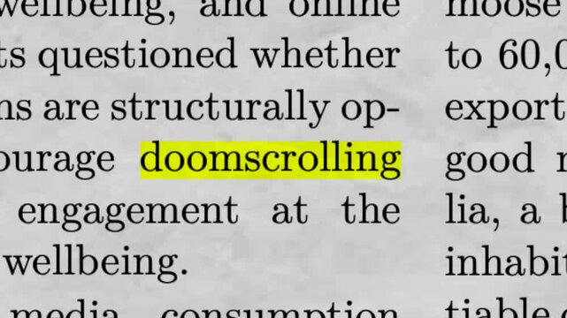 Doomscrolling Highlighted in Newspaper Article Social Media Addiction and Anxiety Concept