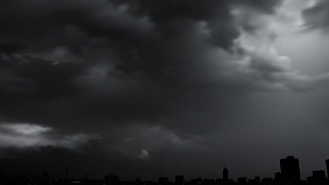 Epic black and white timelapse of a dramatic rainbow over a city during a stormy day