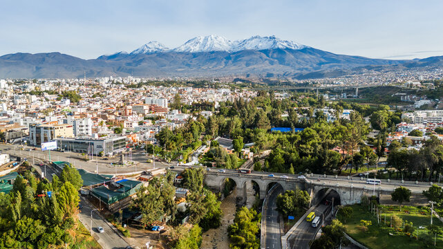 Aerial view of the Grau Bridge and the snow-capped Chachani volcano in Arequipa, Peru