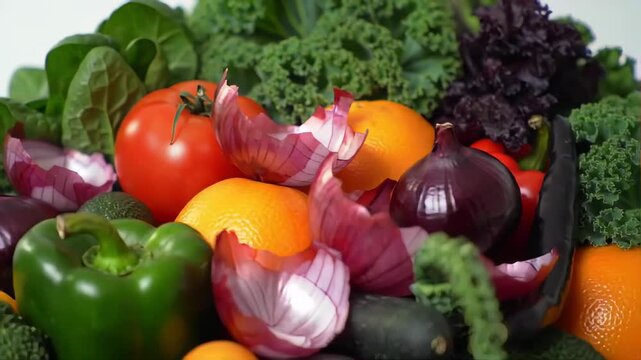 Close-up vibrant assortment of fresh produce, including leafy greens and colorful vegetables