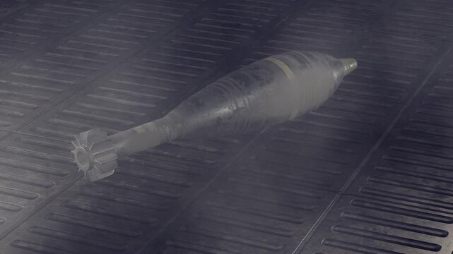 Army projectile missile. Military projectile. Military mortar shells on floor. Ammunition. Bombs. Artillery rounds on dark floor. Amy mortar shells. Rusty artillery shells. Army Mine. Projectile.