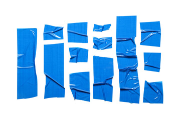 Fototapeta premium Crumpled strips of blue adhesive tape on white background