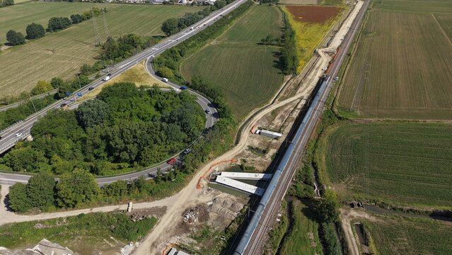 Rail Line Construction Amidst Rural Landscape