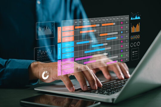 Plan work tasks and deliverables using project manager dashboard, gantt chart schedule for corporate timeline management, tracking business activities and progress on laptop screen