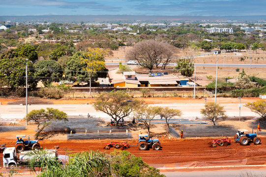 Tractors performing earthwork to prepare the road for paving. Bras&iacute;lia, Brazil, 2026