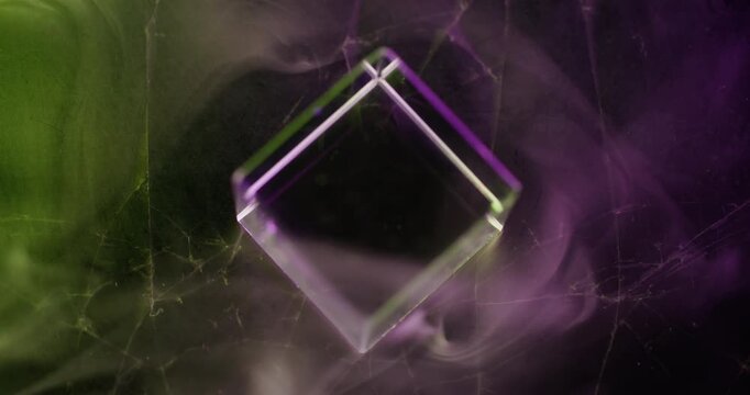 Fluorescent cube. Haze mist. Defocused purple yellow neon color glitter smoke steam explode glass on abstract art light background.