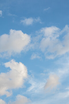 White Fluffy Clouds in Blue Sky