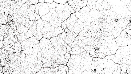 Fototapeta premium Cracked earth surface with dry mud and small holes and cracks all over it