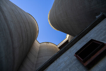Looking up between old grain silos © Christian